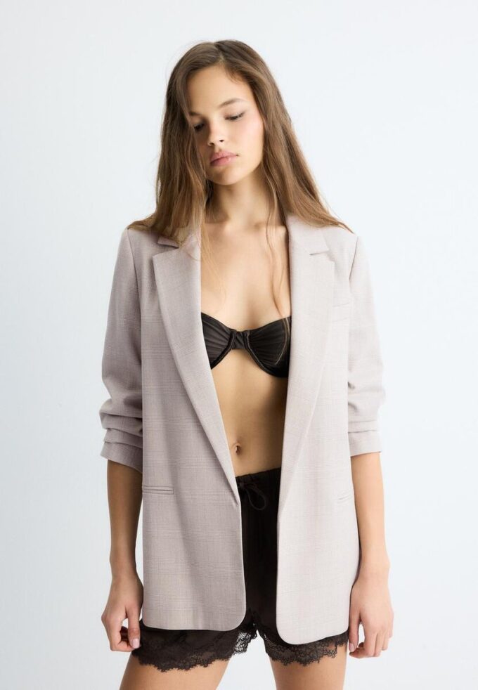 Blazer aberto às riscas