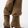 Botas altas de salto agulha Slouchy em pele