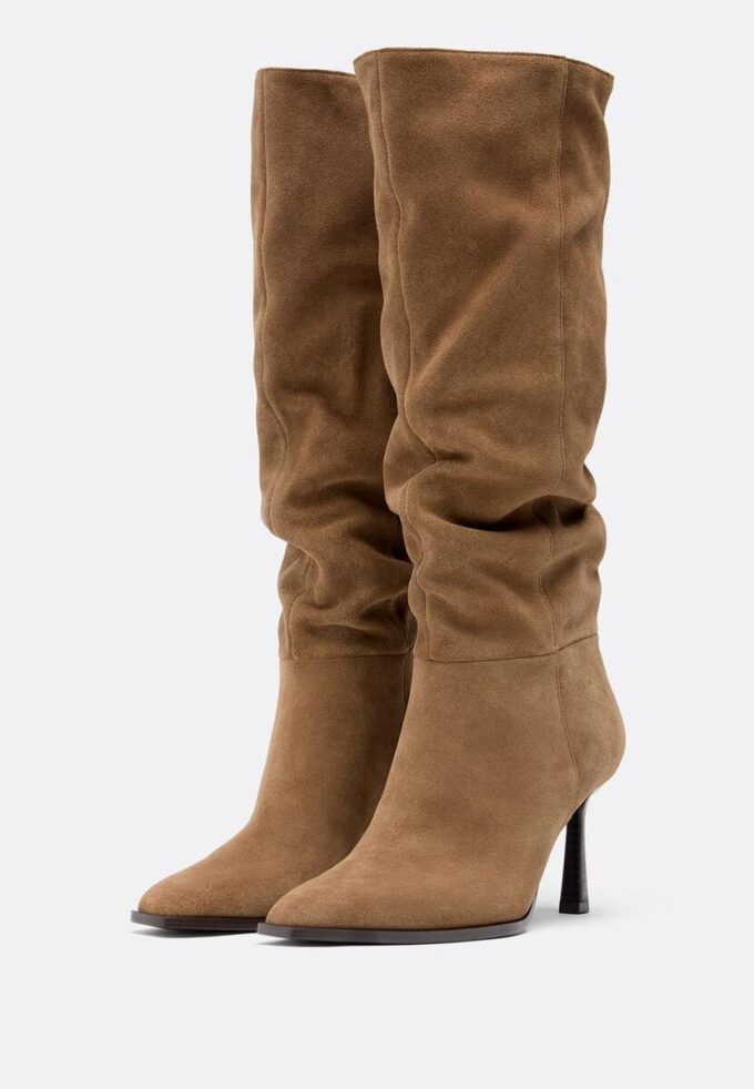 Botas altas de salto agulha Slouchy em pele