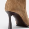 Botas altas de salto agulha Slouchy em pele