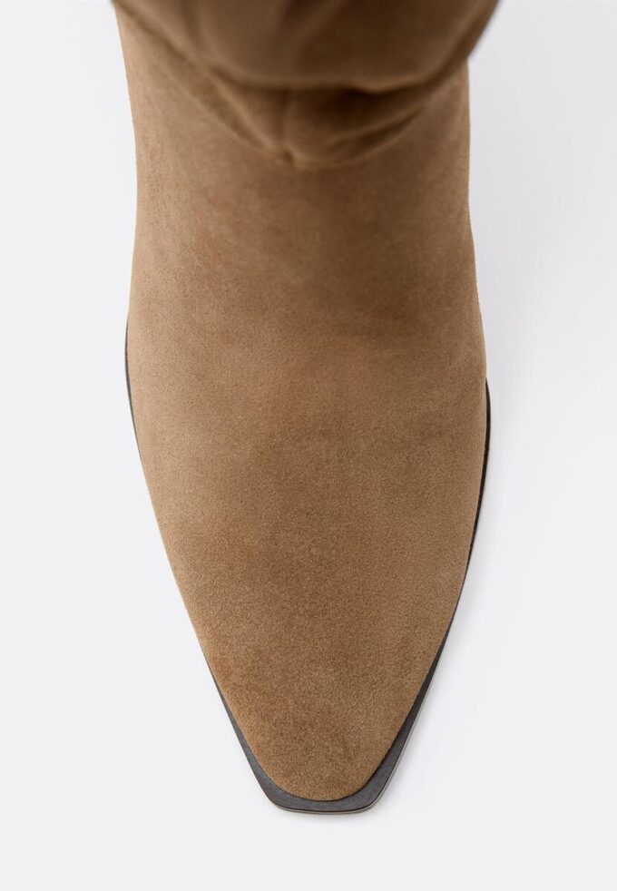 Botas altas de salto agulha Slouchy em pele