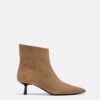 Botas de cano curto em pele com salto baixo