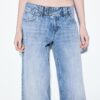 Calças de ganga de cintura baixa e perna Wide Leg com botão decorativo Calças de ganga de cintura baixa e perna Wide Leg com botão decorativo