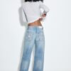 Calças de ganga de cintura baixa e perna Wide Leg com detalhe de estrela Calças de ganga de cintura baixa e perna Wide Leg com detalhe de estrela