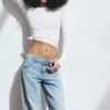 Calças de ganga de cintura baixa e perna Wide Leg com detalhe de estrela Calças de ganga de cintura baixa e perna Wide Leg com detalhe de estrela