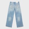 Calças de ganga de cintura baixa e perna Wide Leg com detalhe de estrela Calças de ganga de cintura baixa e perna Wide Leg com detalhe de estrela
