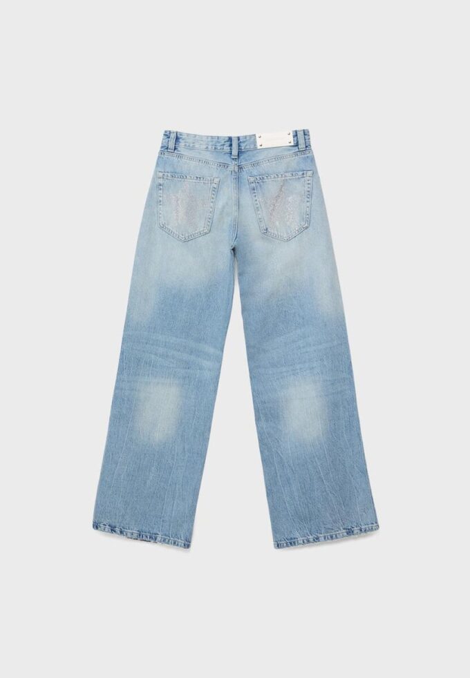 Calças de ganga de cintura baixa e perna Wide Leg com detalhe de estrela Calças de ganga de cintura baixa e perna Wide Leg com detalhe de estrela