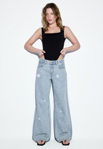 Calças de ganga de cintura baixa e perna Wide Leg com strass