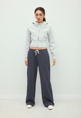 Calças jogger wide leg às riscas Calças jogger wide leg às riscas