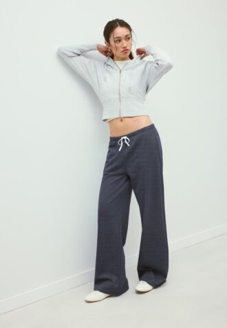 Calças jogger wide leg às riscas Calças jogger wide leg às riscas
