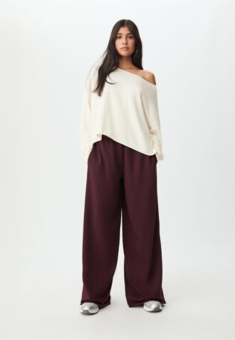 Calças wide leg felpudas com detalhes de acabamento