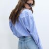 Camisa balão em dois materiais