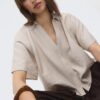 Camisa esvoaçante com botões
