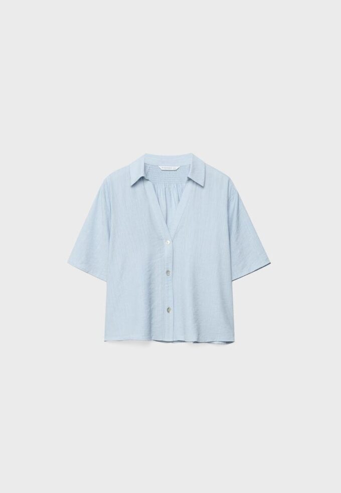 Camisa esvoaçante com botões