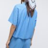 Camisa esvoaçante com botões