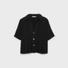 Camisa esvoaçante com botões Camisa esvoaçante com botões