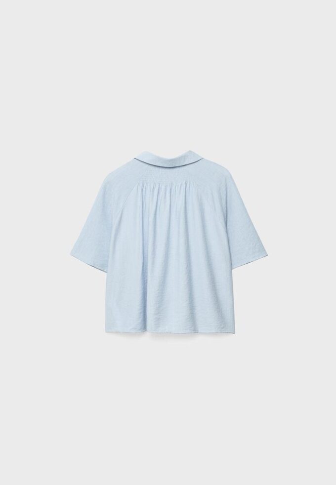 Camisa esvoaçante com botões