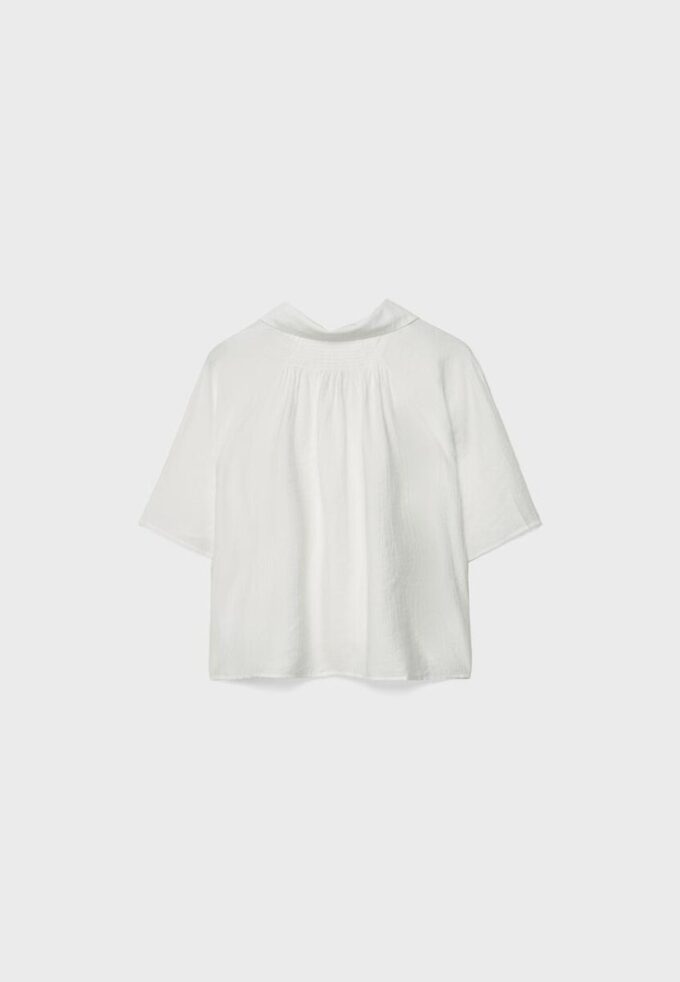 Camisa esvoaçante com botões
