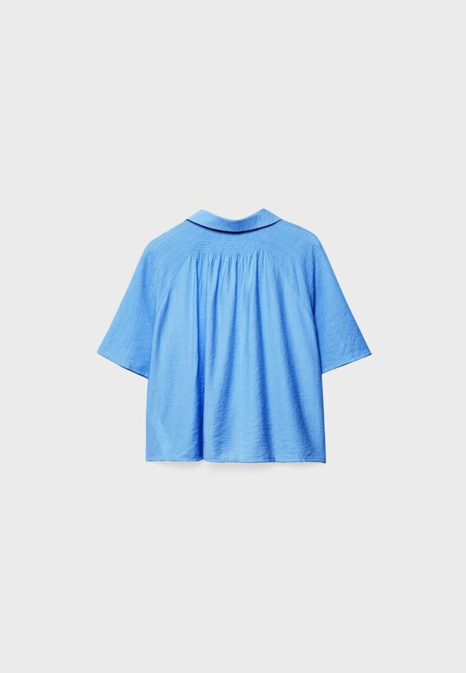 Camisa esvoaçante com botões