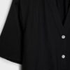 Camisa esvoaçante com botões Camisa esvoaçante com botões