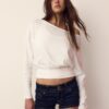 Camisas de manga comprida com decote em barco e bainha com faixa Camisas de manga comprida com decote em barco e bainha com faixa