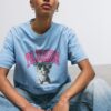 Camisas de manga curta com estampa e apliques Camisas de manga curta com estampa e apliques