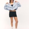 Camisola bomber com capuz estampada