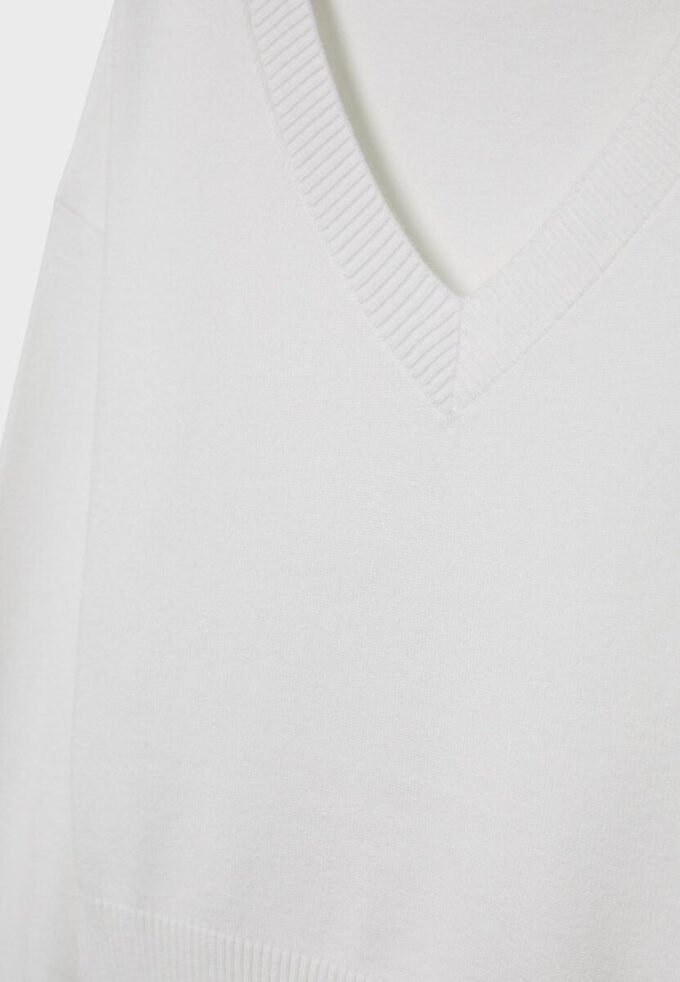 Camisola com decote em V e mangas em forma de asa de morcego Camisola com decote em V e mangas em forma de asa de morcego