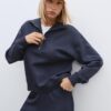 Camisola de gola alta com fecho Camisola de gola alta com fecho