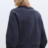 Camisola de gola alta com fecho Camisola de gola alta com fecho