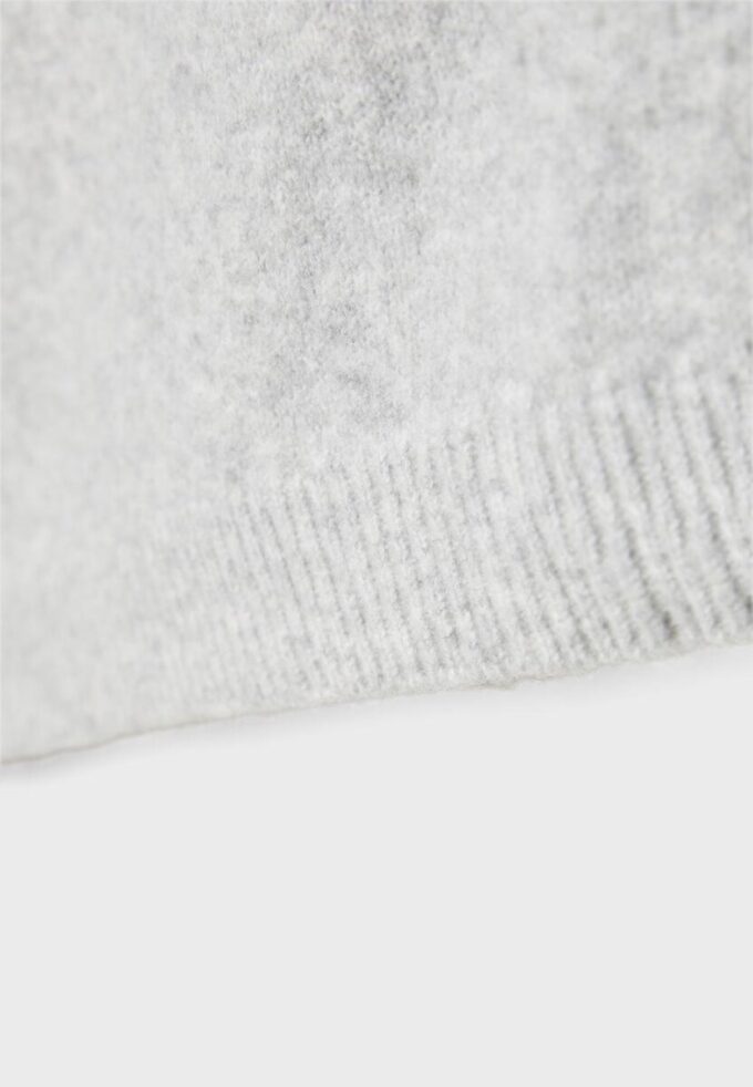 Camisola de malha assimétrica