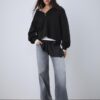 Camisola de malha com fecho
