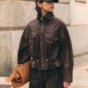 Casaco de pele com bolsos e cintura ajustável Casaco de pele com bolsos e cintura ajustável