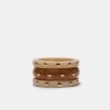 Conjunto de 3 pulseiras rígidas com tachas