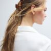 Ganchos de cabelo em forma de croissant