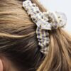 Ganchos de cabelo em tecido às riscas