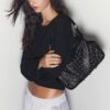 Mala com tachas