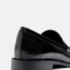 Mocassins com efeito de pele preta