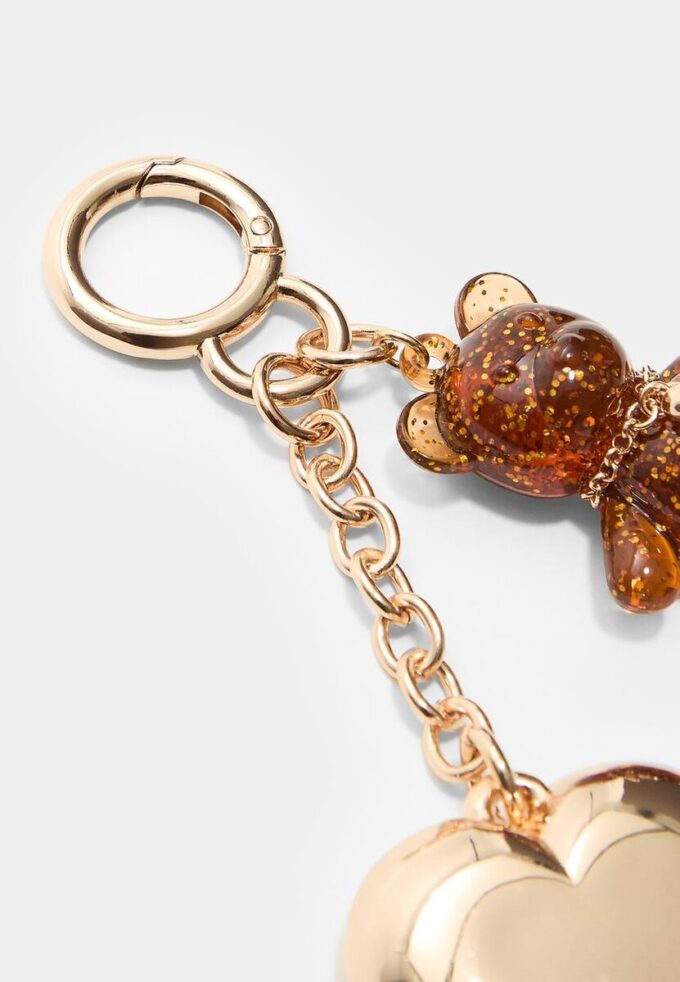 Pingente de urso metálico
