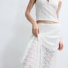 Saia midi assimétrica em renda Saia midi assimétrica em renda