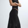 Saia midi assimétrica em renda Saia midi assimétrica em renda