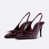 Sapatos de salto com laço