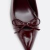 Sapatos de salto com laço