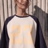 T-shirt com mangas raglan