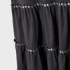 Vestido com folhos e tachas
