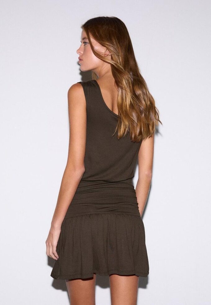 Vestido multifuncional com botões